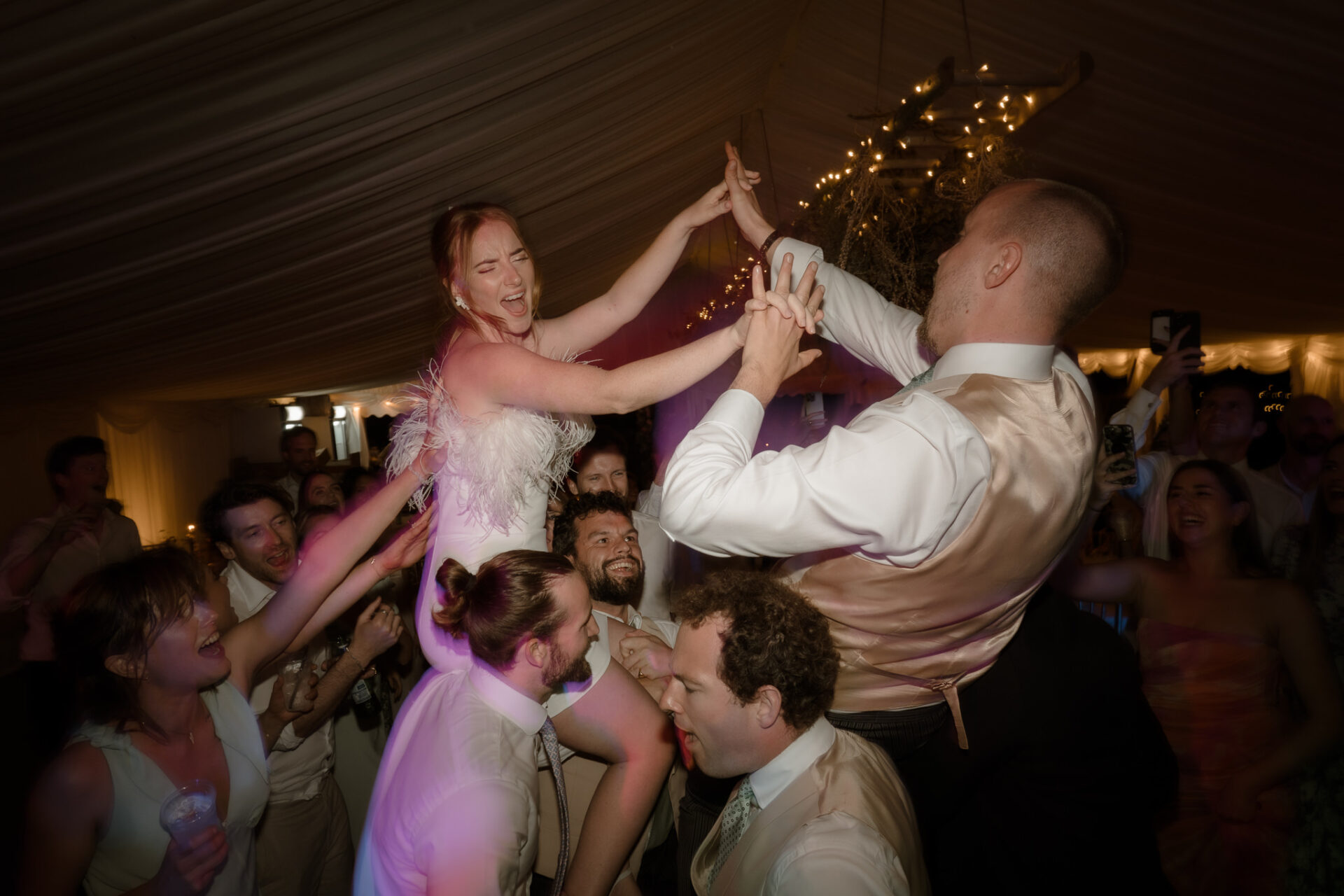A couple dancing at a wedding.